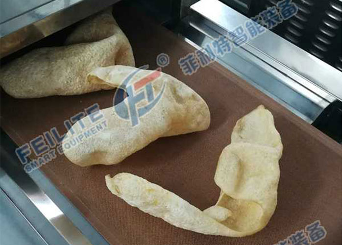 豬皮膨化微波烘干燥設(shè)備成功交付，非油炸更健康